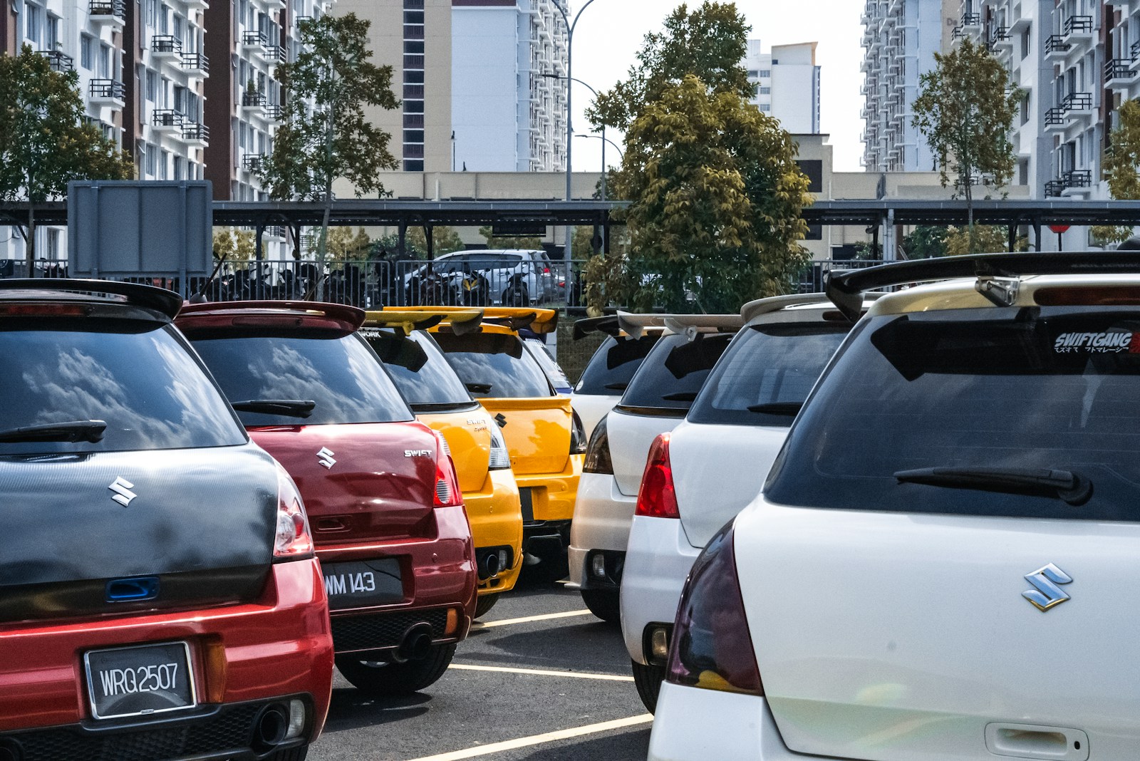 a group of cars in a parking lot